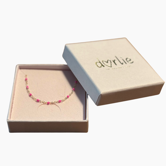 Armband gold mit pinken Emaille-Kügelchen