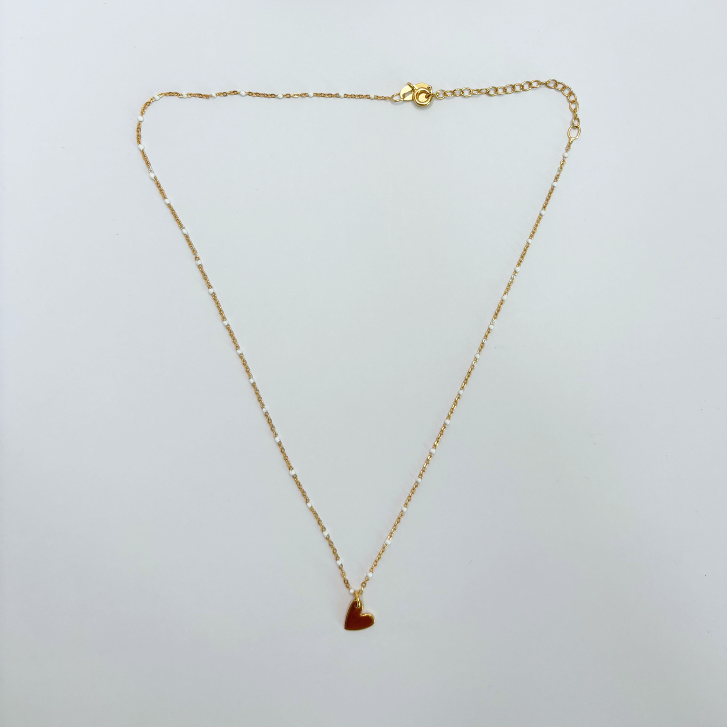 Halskette gold mit weißen Emaille - Kügelchen