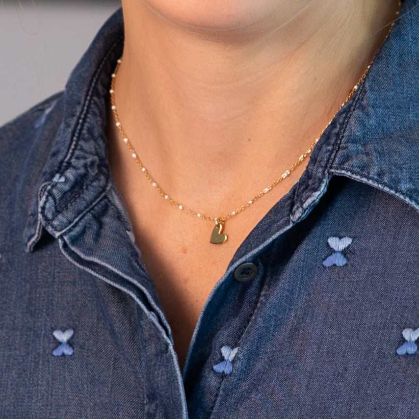 Halskette gold mit weißen Emaille - Kügelchen