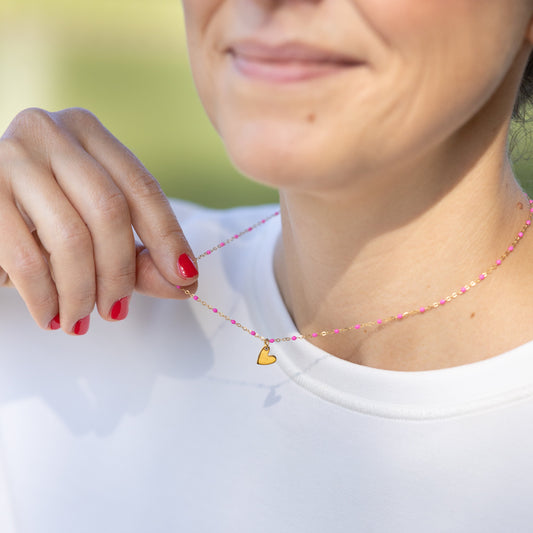 Halskette gold mit pinken Emaille-Kügelchen