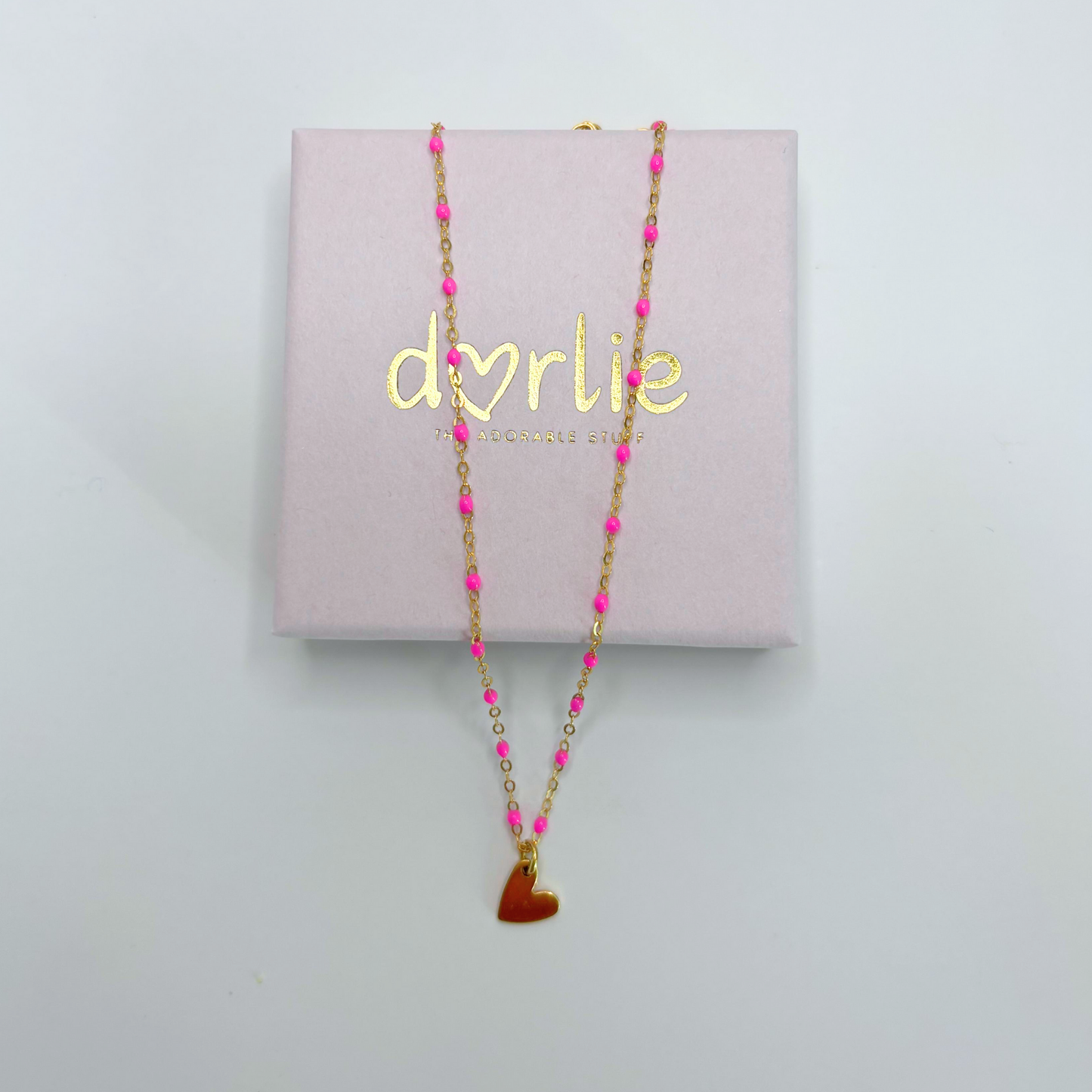 Halskette gold mit pinken Emaille-Kügelchen